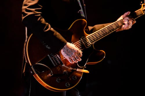 Free Person Playing Guitar Stock Photo